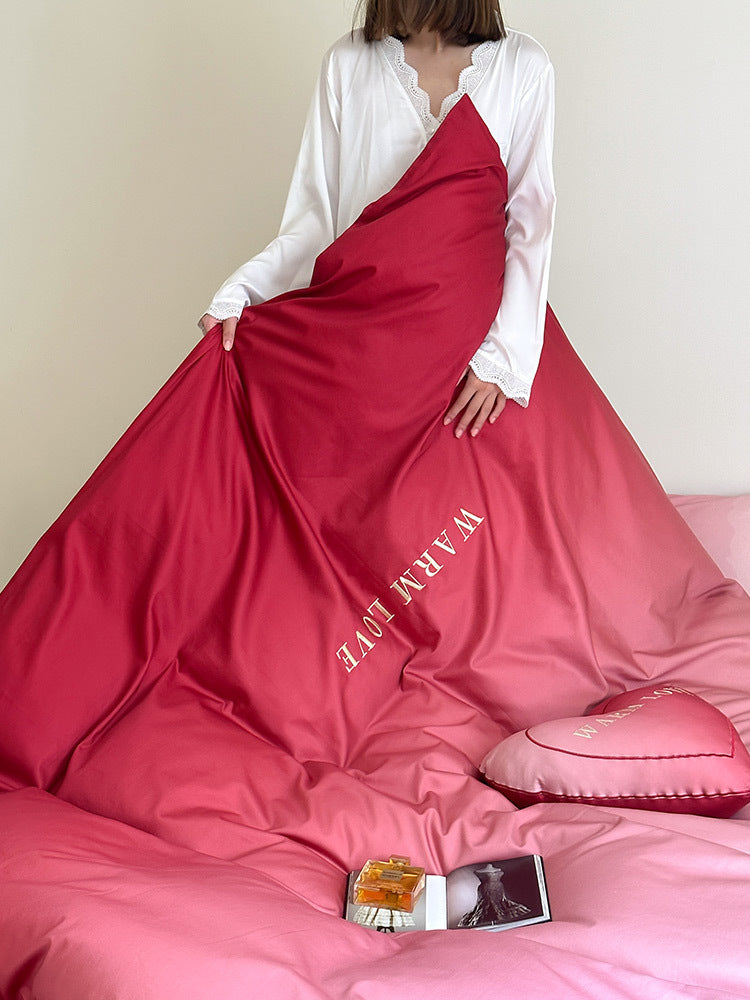 Luxurious satin bedding set with heart pillow and reversible function