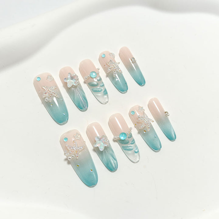 Elegant Nail Art with Ocean Theme and 3D Accents Kalsten