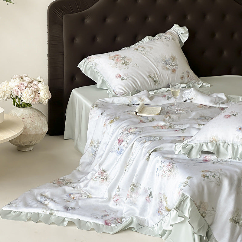 Satin sleep set with silky finish, watercolor flower motif and ruffle edges