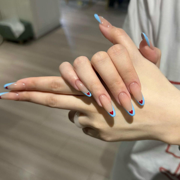 Nail art with heart-shaped design Kalsten