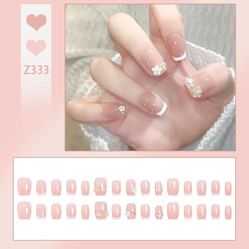 Nail set with elegant flower appliqués and exquisite glitter embellishments Kalsten