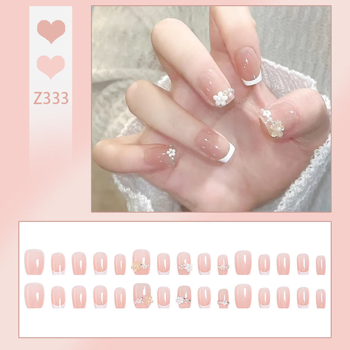 Nail set with elegant flower appliqués and exquisite glitter embellishments Kalsten
