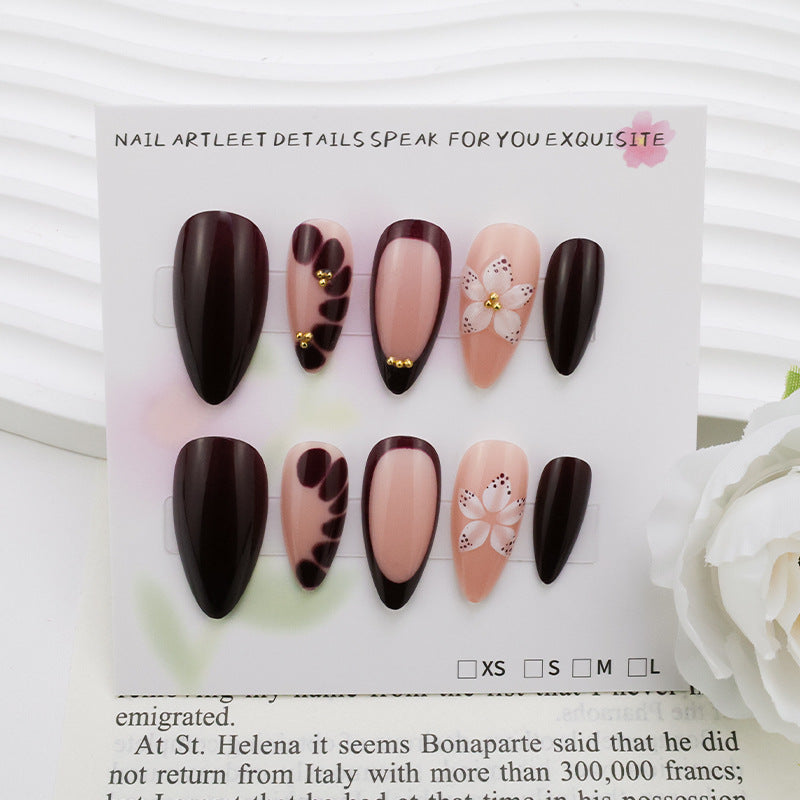 Acrylic nail set with elegant floral patterns and glamour accents Kalsten