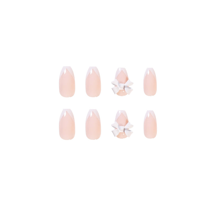 Elegant artificial nails with translucent French tip and decorative floral accents Kalsten