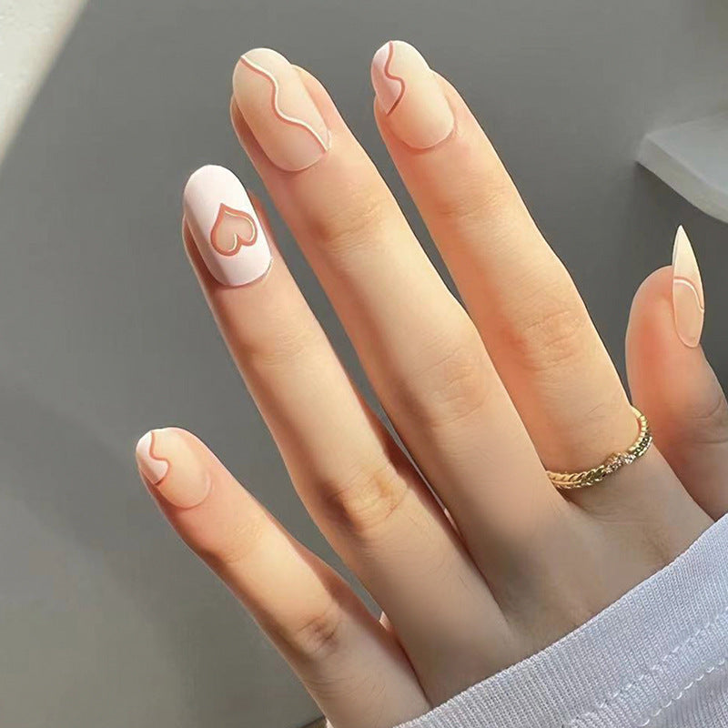 Artful Nail Extensions with Elegant Heart Design Kalsten