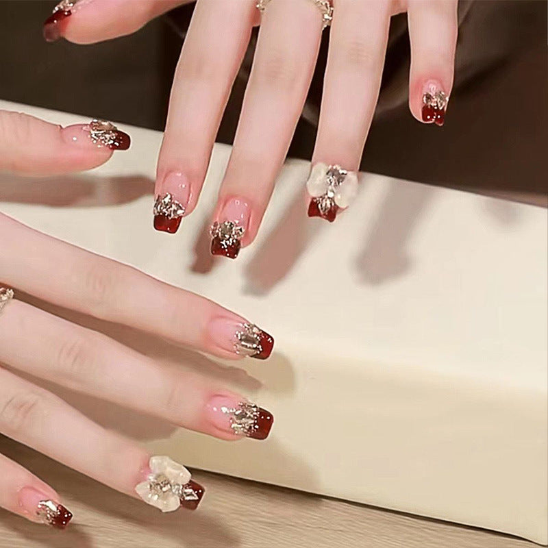 Artificial nails with glamorous floral decorations Kalsten