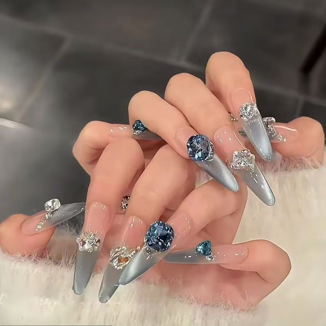 Artistic Stiletto Press-On Nail Art with Glimmering Accents Kalsten