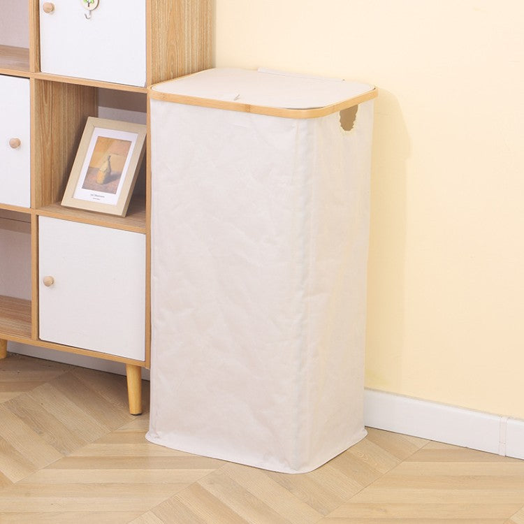 Stylish laundry basket with wooden lid Kalsten