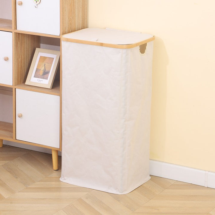 Stylish laundry basket with wooden lid Kalsten