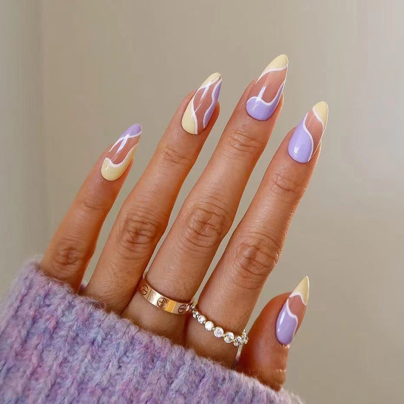 Artful Nail Extensions with Wave Design and Colorful Accents Kalsten