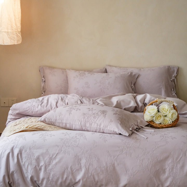 Fine cotton bedding set with jacquard floral pattern and side decorative ribbons