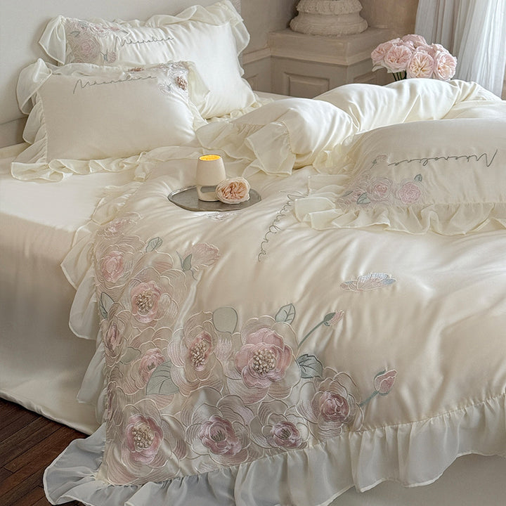 Luxurious satin bed linen set with relief-embroidered rose appliqués and ruffles
