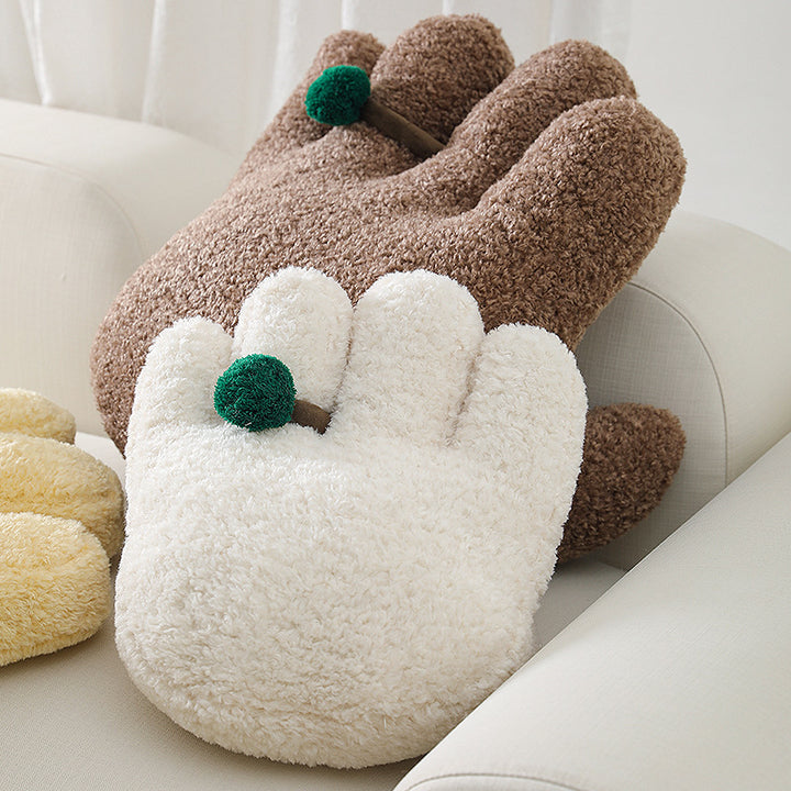 Plush decorative pillow in hand shape with pompon application Kalsten