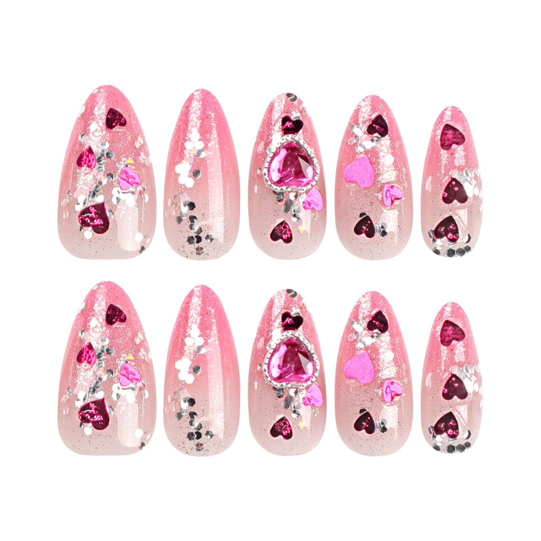 Artful nail art with playful heart designs and glitter Kalsten