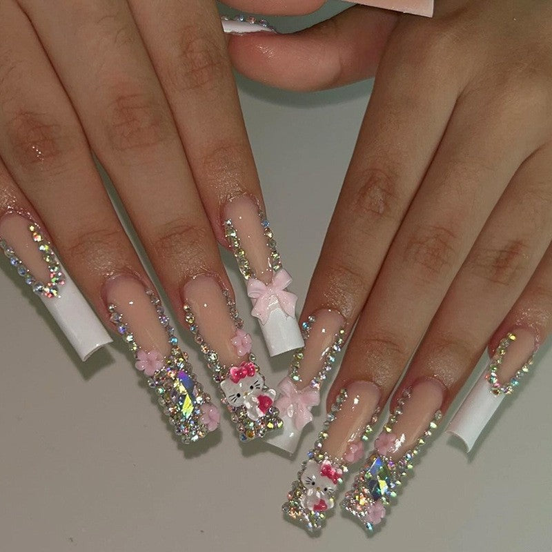 Glamorous artificial nail set with sparkling rhinestone embellishments and creative animal designs Kalsten