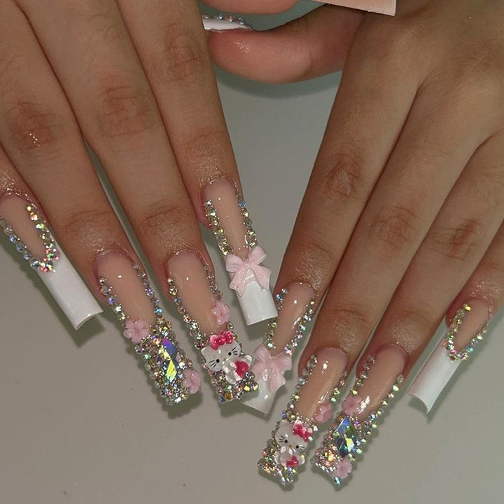 Glamorous artificial nail set with sparkling rhinestone embellishments and creative animal designs Kalsten