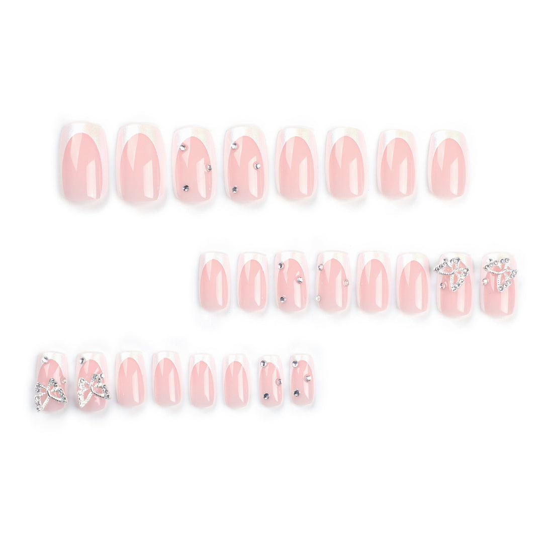 Elegant Nail Art with Glitter and Floral Accents Kalsten