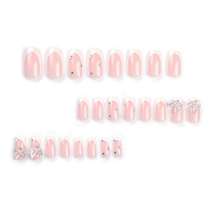 Elegant Nail Art with Glitter and Floral Accents Kalsten