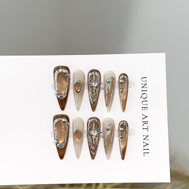 Artistic Press-On Nail Design Set with Unique Gemstone Accents