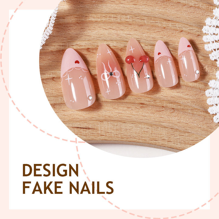 Artifical nails with playful heart and bow designs Kalsten