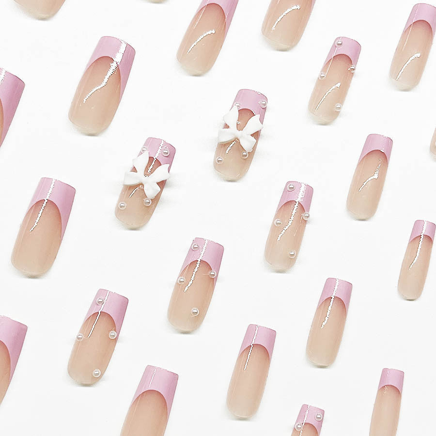 Artificial nail set with romantic bow and pearl embellishments Kalsten