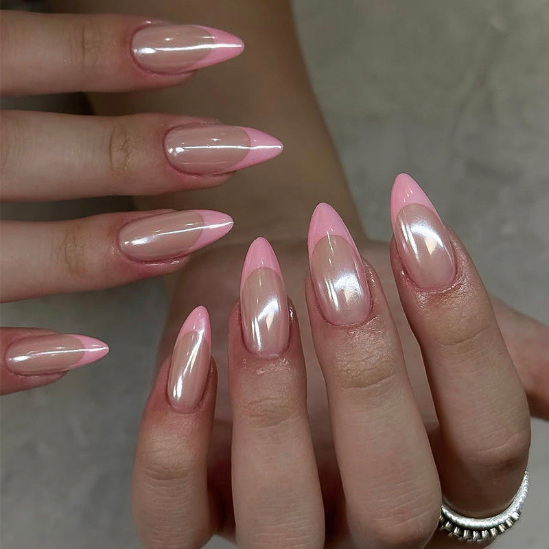 Acrylic nail set with elegant pointed shapes and glossy accents Kalsten