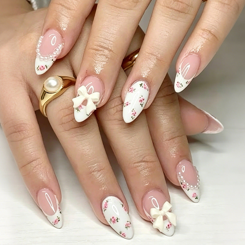 Artificial nail set with romantic flower motifs and elegant details Kalsten