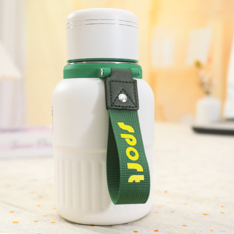 Insulated drinking bottle with integrated carrying strap Kalsten