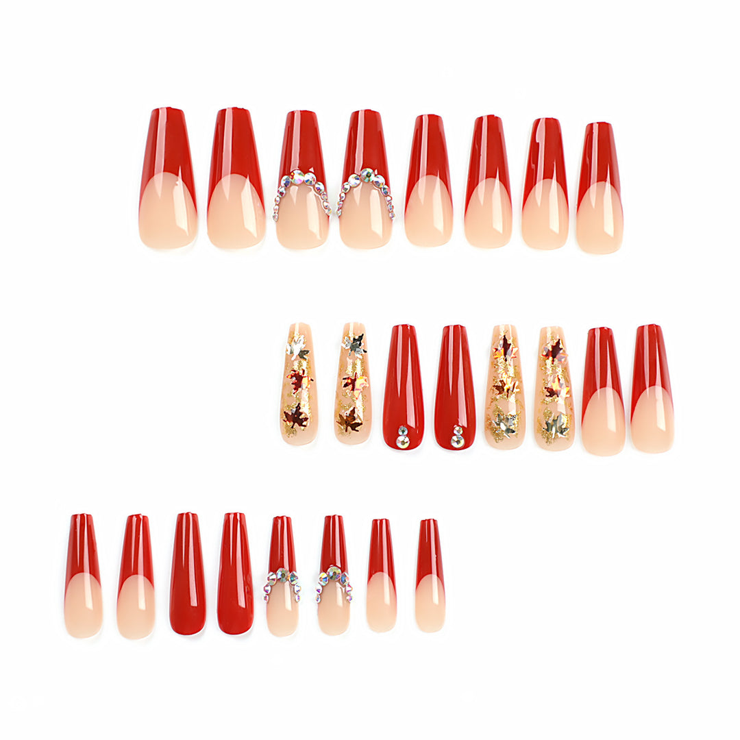 Glamorous acrylic nails with leaf design and glitter accents Kalsten