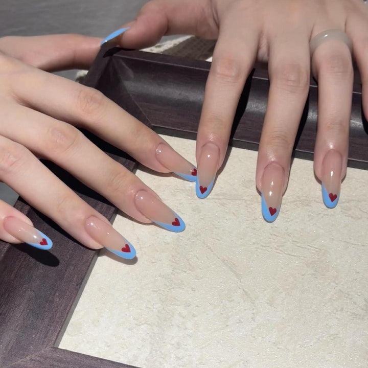 Nail art with heart-shaped design Kalsten