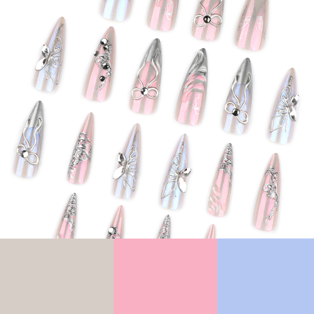 Artful stiletto nails with delicate silver casting decoration Kalsten