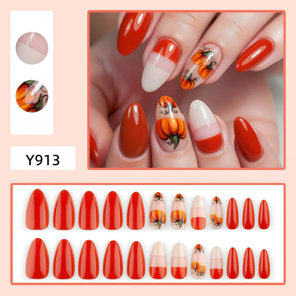 Artificial nails in autumn pumpkin design Kalsten