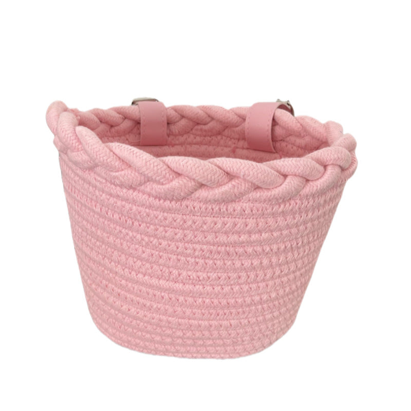 braided rope bike basket with pom pom embellishments and leather handlebar straps Kalsten