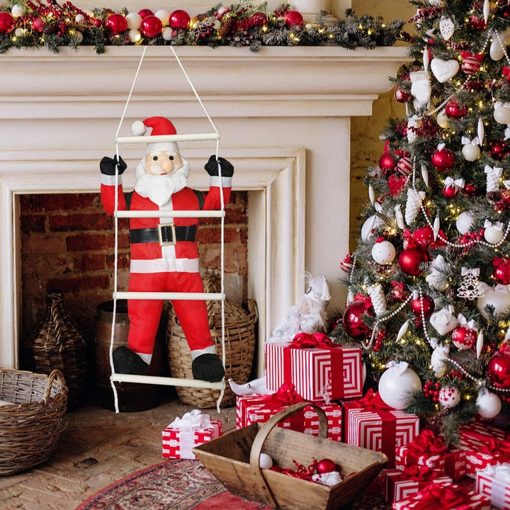 Inflatable Santa Claus figure on ladder