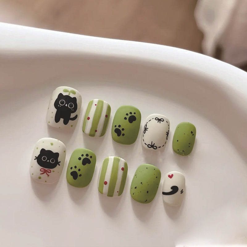 Creative art press-on nails with playful animal design Kalsten