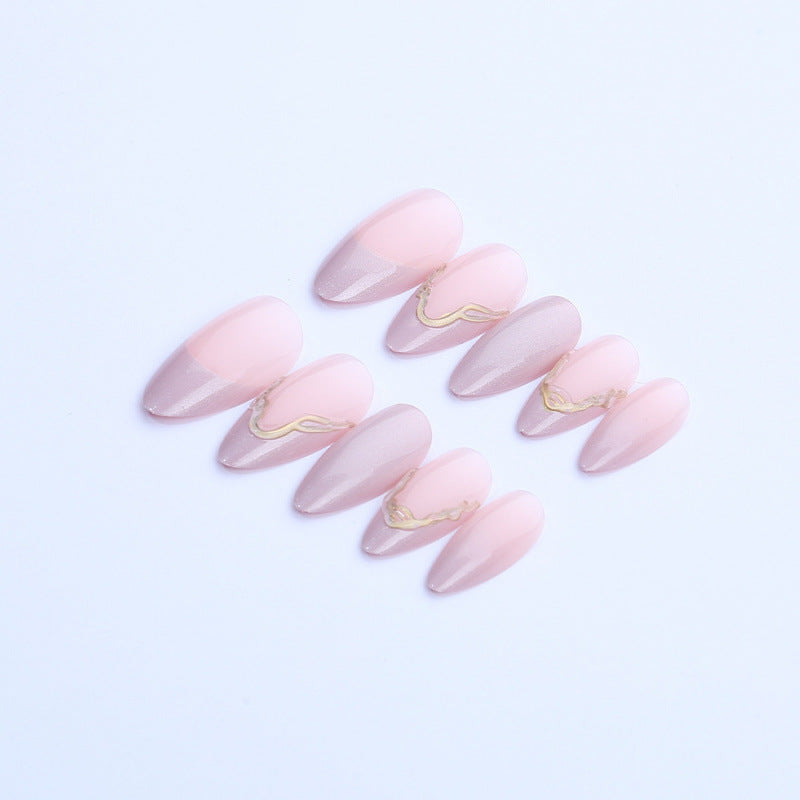 Acrylic nail set with glamorous tips and golden accents Kalsten