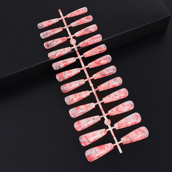Creative nail art with blood splatter design Kalsten