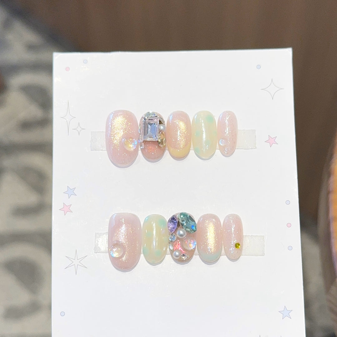 Artificial nails with shimmering effects and crystal accents Kalsten
