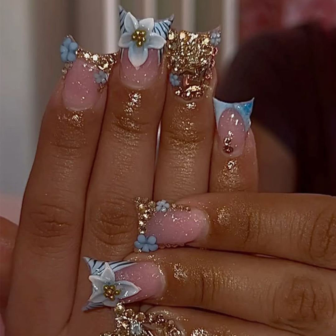 Artful Nail Extensions with Floral Design and Glitter Kalsten
