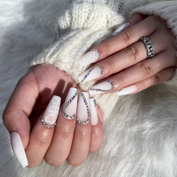Artful Nail Extensions with Heart Design and Glitter Accents Kalsten