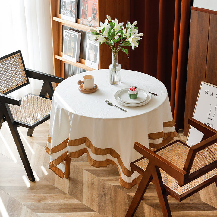 Round tablecloth with quilted textured relief and double-layered ruffle Kalsten