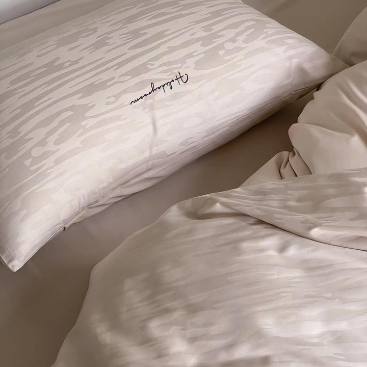 Finest cotton satin bedding set with textured wave pattern and hotel closure