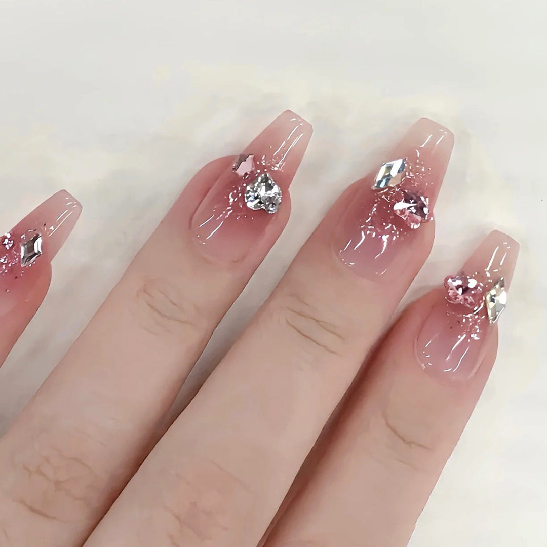 Glamorous artificial nails with glitter and crystal embellishment Kalsten