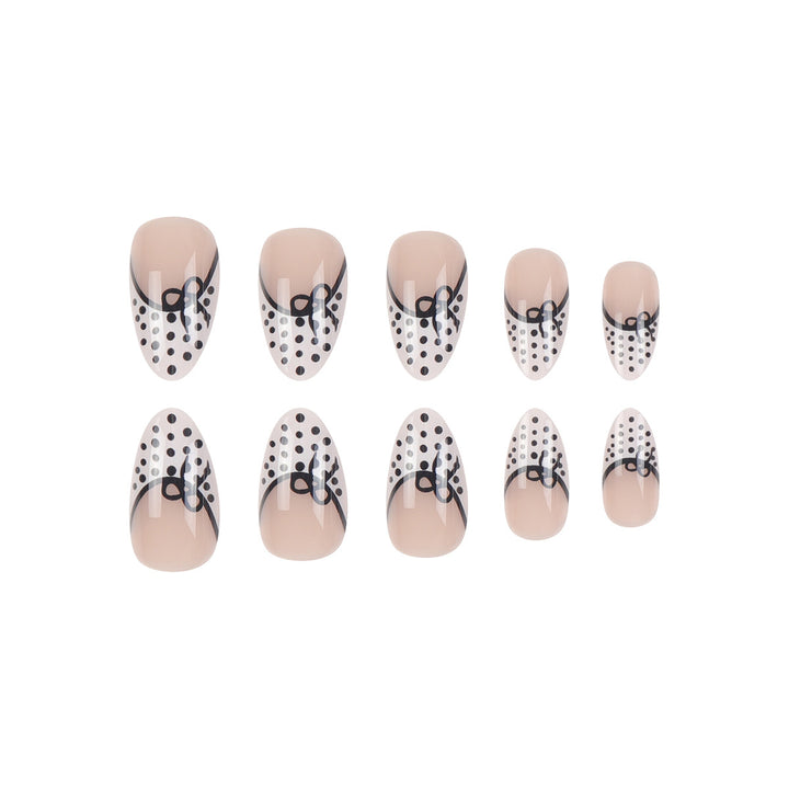 Elegant Stiletto Press-On Nails with Polka Dot Design and Bow Accents Kalsten