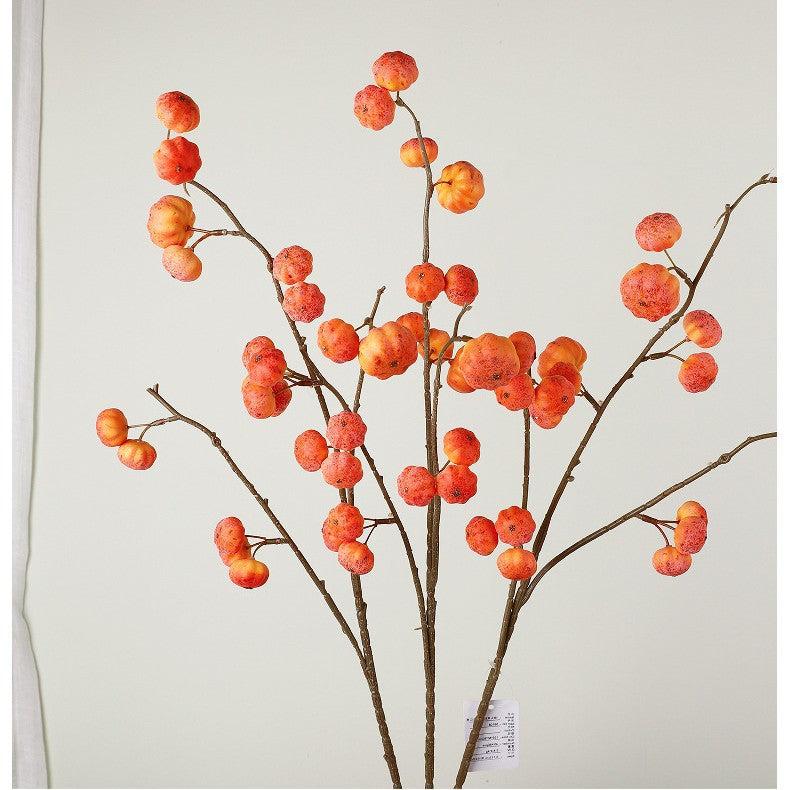 Artificial decorative branch with dried-looking pumpkin balls and flexible wire stem