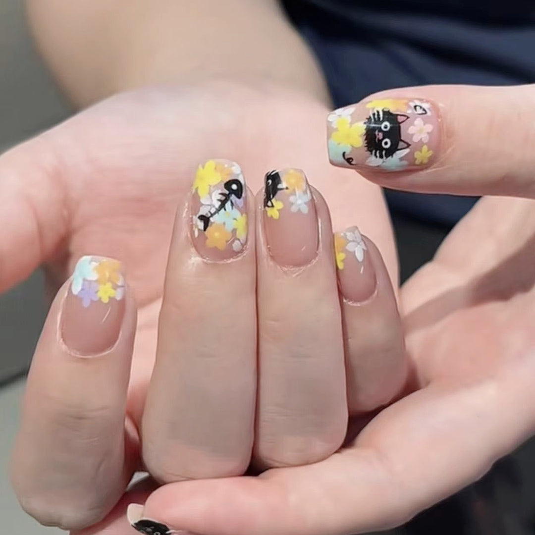 Decorative Long Stiletto Press-On Nails with Heart and Floral Accents Kalsten