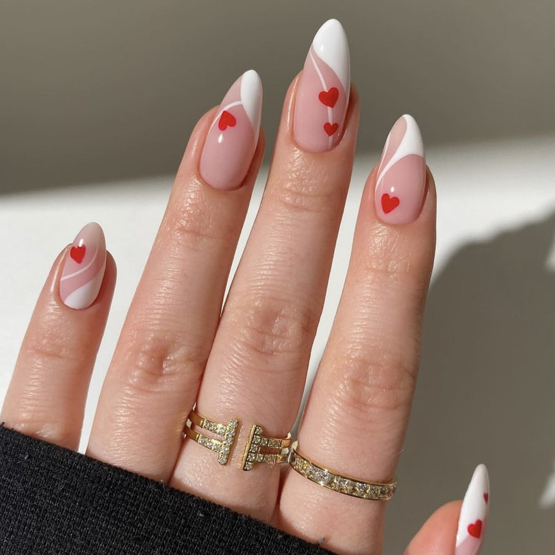 Heart-Embellished Stiletto Nail Art Kalsten