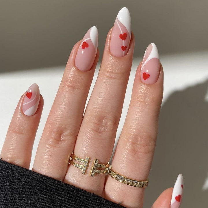 Heart-Embellished Stiletto Nail Art Kalsten