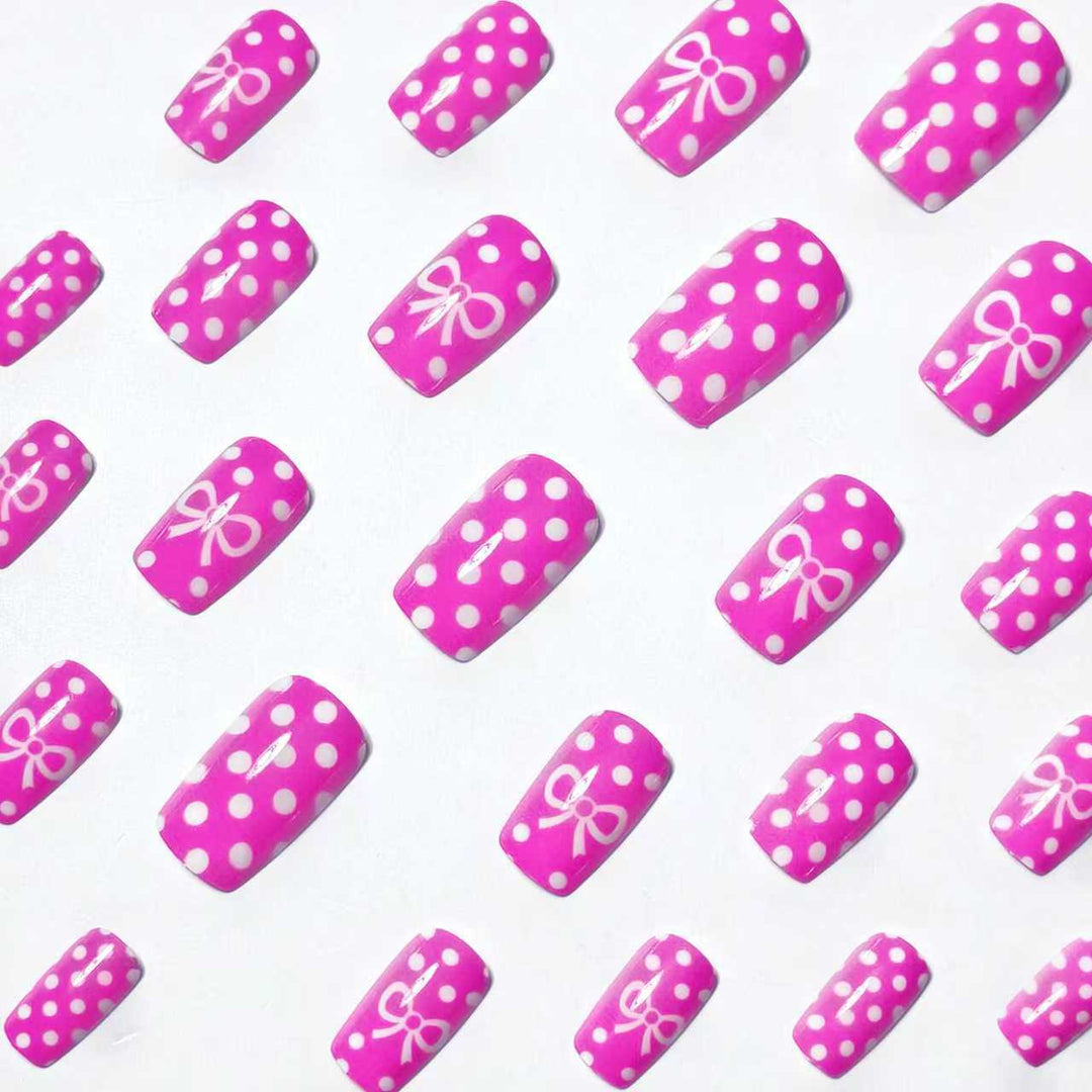 Artificial nails with romantic polka dot pattern and bow Kalsten