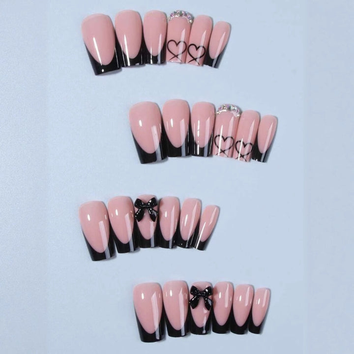 Acrylic nail set with elegant heart and bow design Kalsten